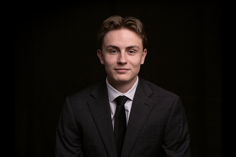 A portrait of Adam Mount